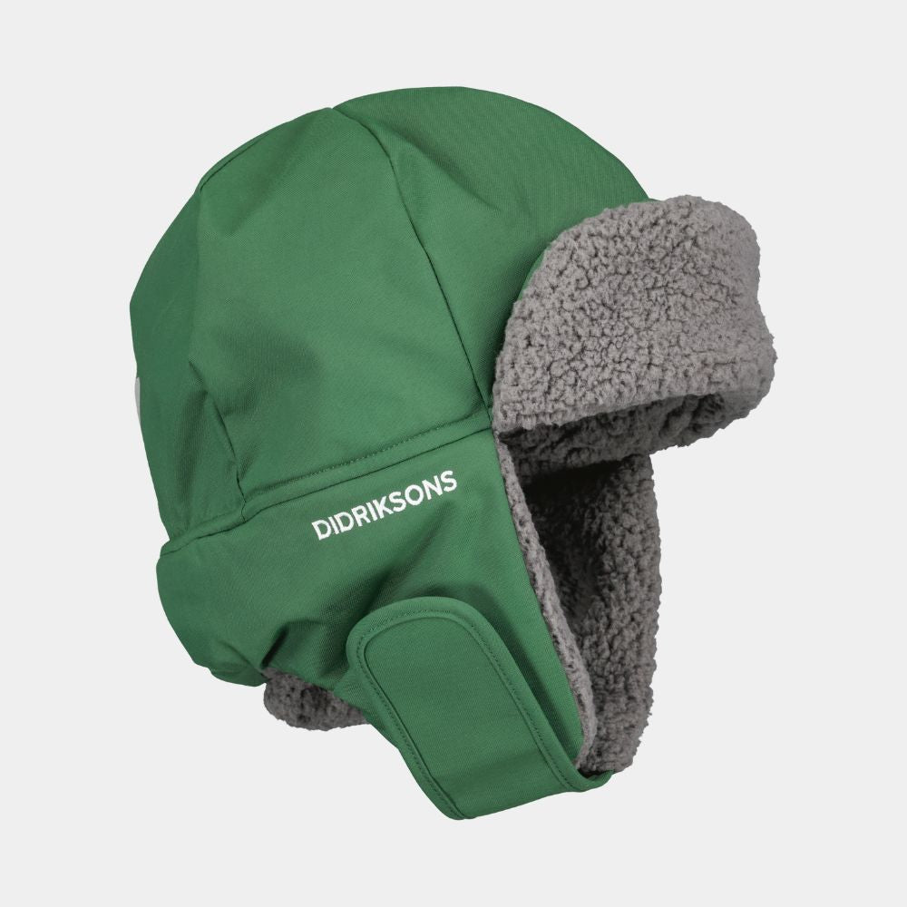 Didriksons Biggles Kids Winter Hat - Pine Green. Warm kids hat for Lapland and Skiing Trips