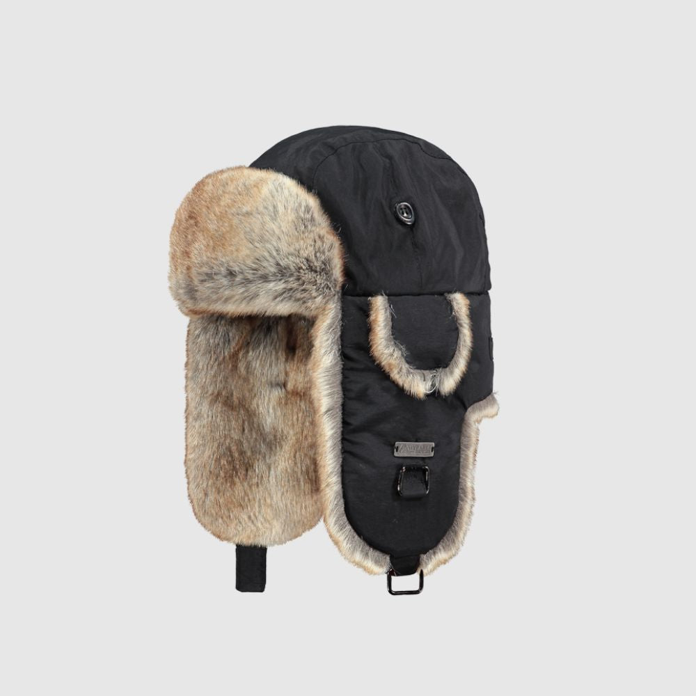 Black winter hat with fur trim on a light gray background