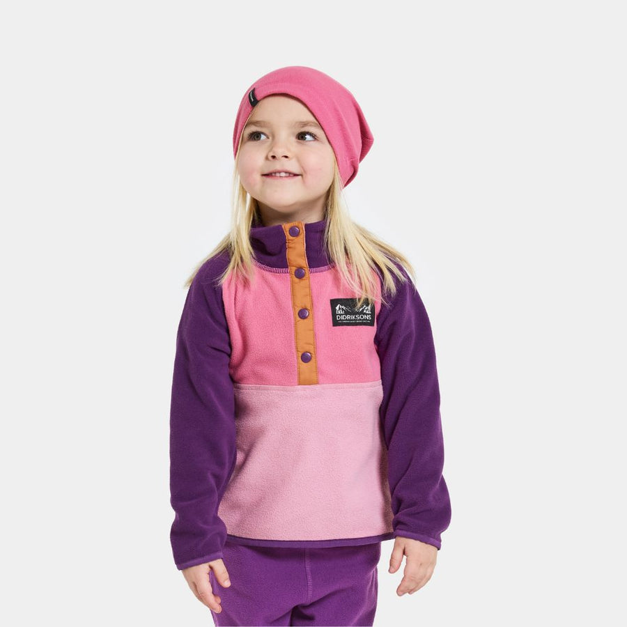 Didriksons Monte Half Button Kids Fleece - Light Heather Pink. Warm girls fleece suitable for skiing and Lapland holidays