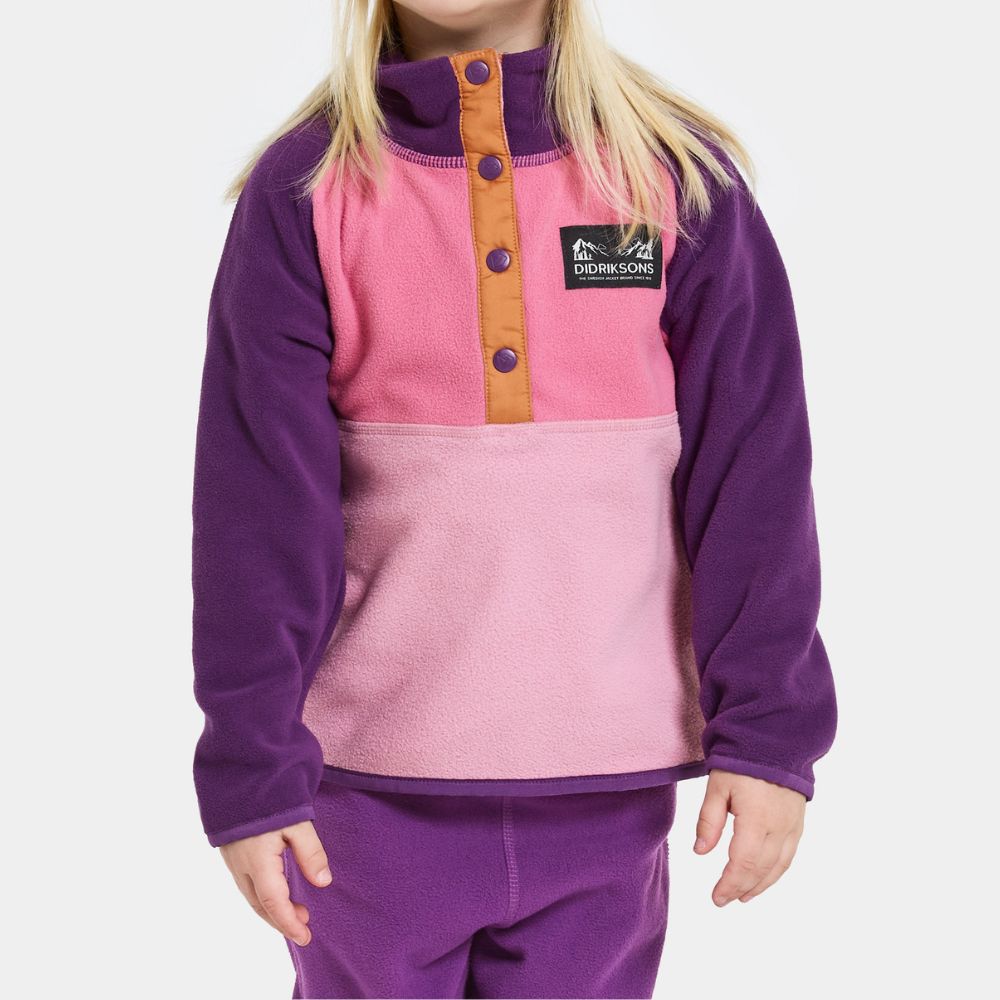 Didriksons Monte Half Button Kids Fleece - Light Heather Pink. Warm girls fleece suitable for skiing and Lapland holidays