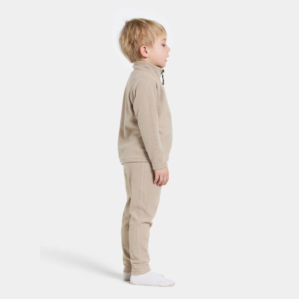 Didriksons Monte Kids Fleece Leggings in Beige.  Ideal for layering when skiing early season, high resports or Lapland Holidays 